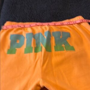 Orange cropped sweatpants, Victoria Secret Pink brand. XS.